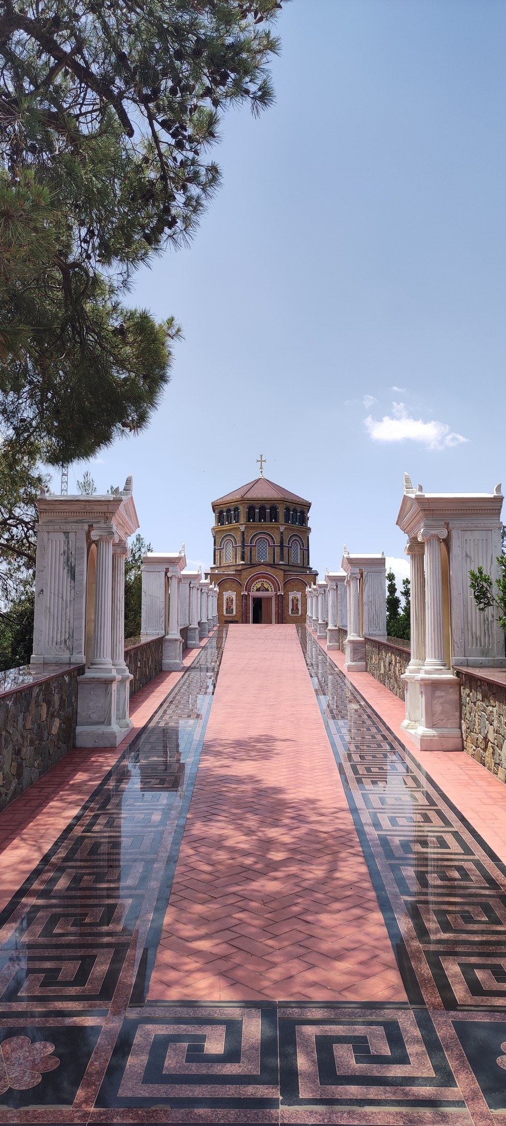 The Chapel of Panagia at Throni — the highest sanctuary of the monastery, approached by a marble colonnade lined with mosaics of the Greek key, where the icon was carried in procession during droughts.